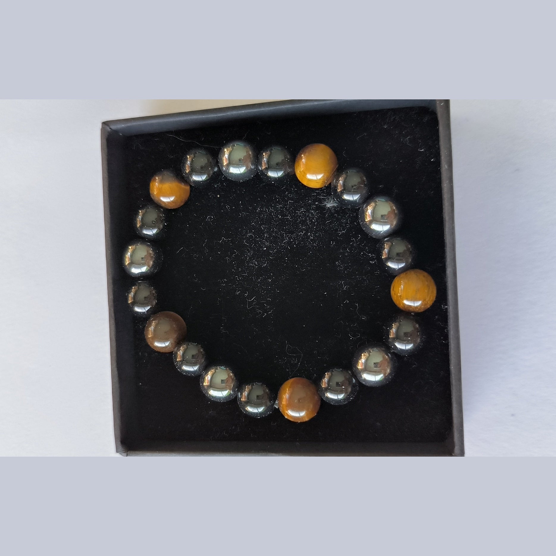 Bracelet Œil de Tigre & Hématite – Élégance et Caractère